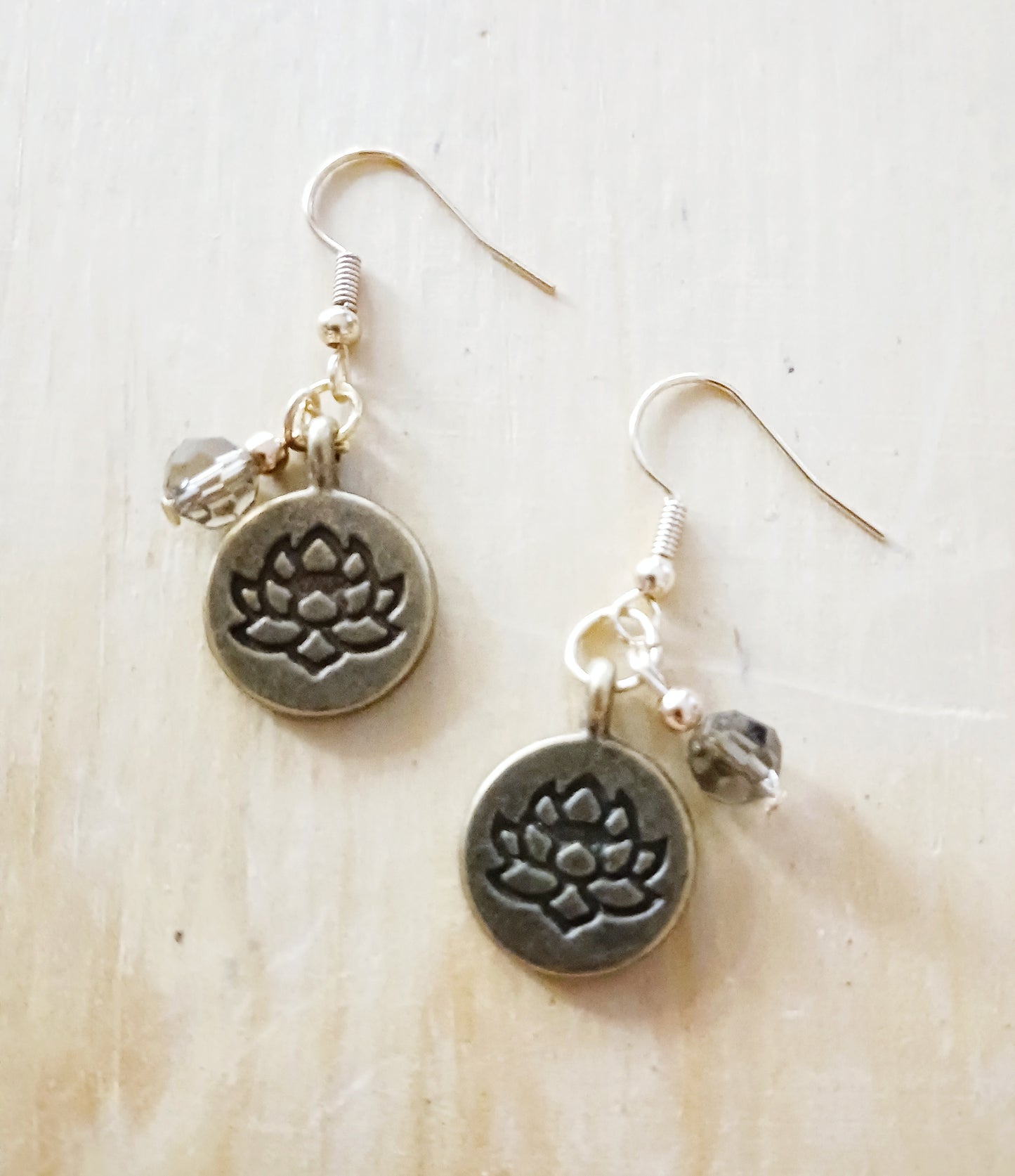 Earrings: Lotus flower stamped charm with bead