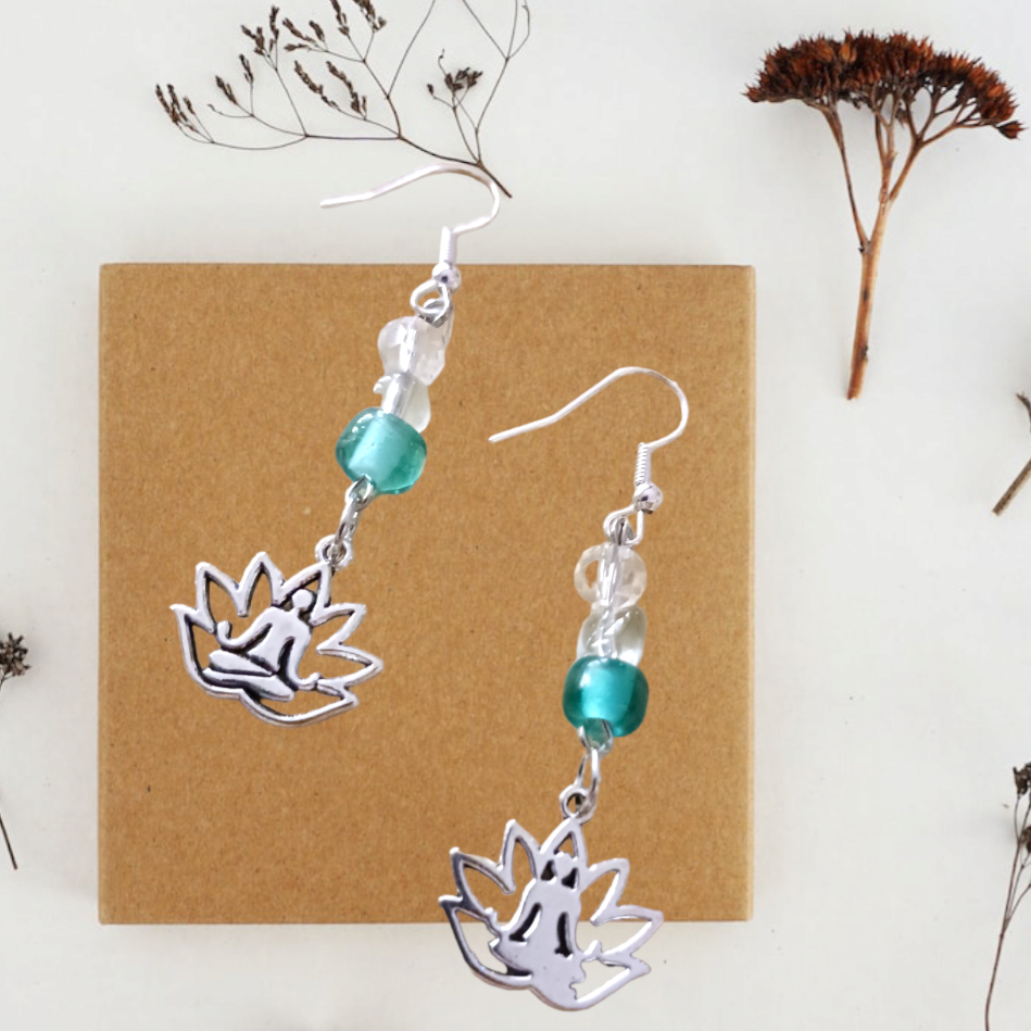 Earrings: Lotus flower/meditation charm